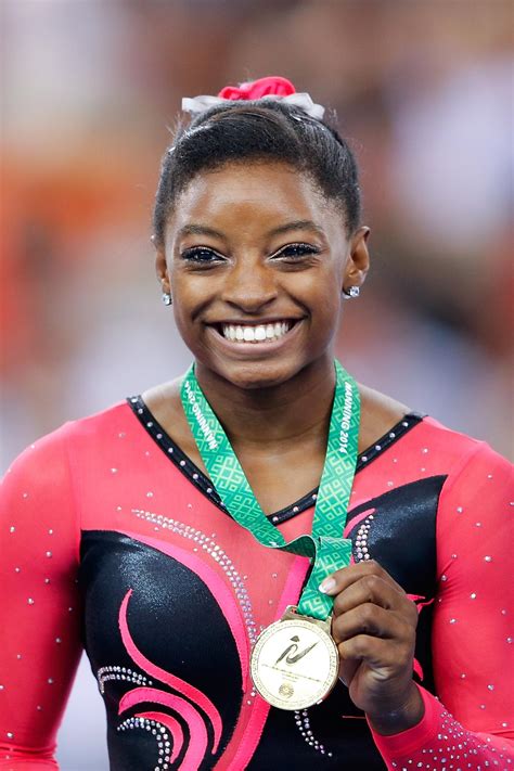 simone biles gymnastics photos.